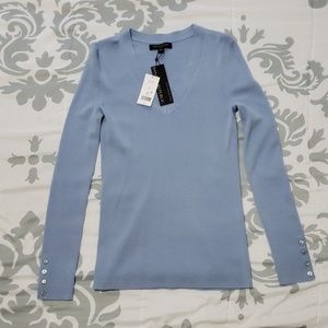 Banana Republic 100% merino wool.